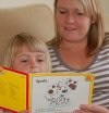 Parent listening to child read
